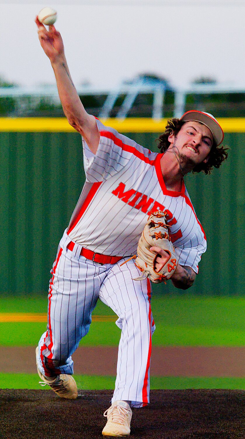 Mineola pitcher Kaden Bell delivers one of his 88 pitches in his 7-inning shutout performance. [more photos]